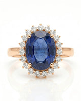 Princess Diana-inspired sapphire ring with classic diamond halo in rose gold - SARATTI