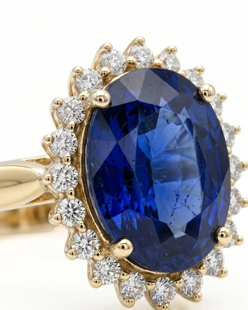 Princess Diana-inspired sapphire ring with classic diamond halo in yellow gold | SARATTI