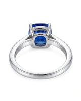 Prong set blue sapphire ring with minimalist diamond band in platinum | SARATTI
