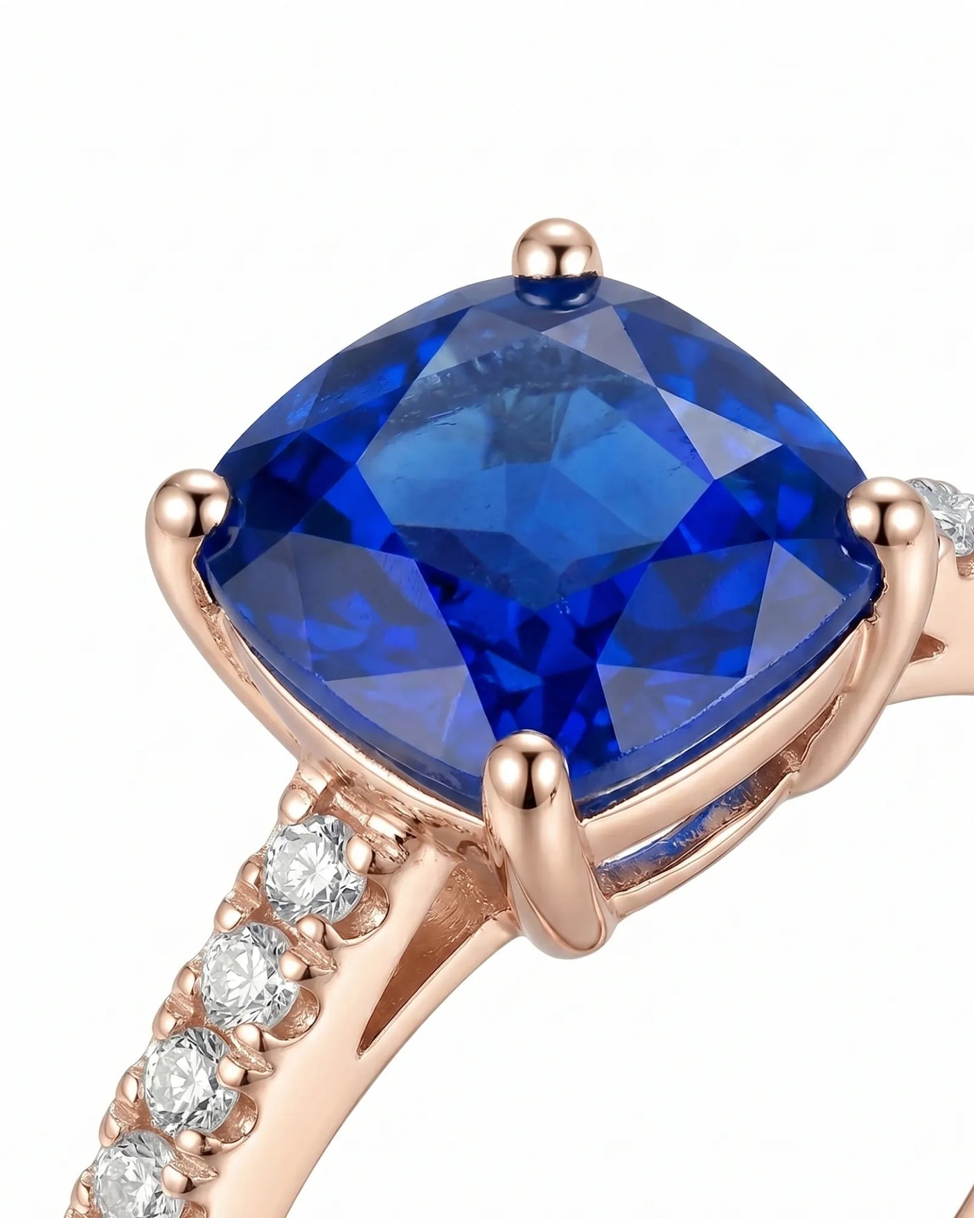 Prong set blue sapphire ring with romantic diamond band in 18K rose gold | SARATTI
