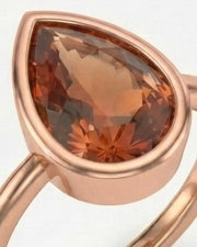 Protective pear-point Imperial Topaz setting with open gallery | SARATTI