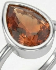 Protective pear-point Topaz setting with an open white gold gallery | SARATTI