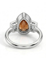 Protective pear Imperial Topaz Build My Ring setting with full bezel | SARATTI