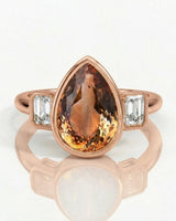 Protective pear Topaz setting with sculpted 18K rose gold bezel | SARATTI