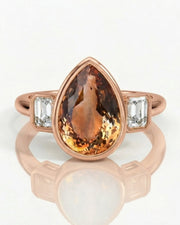 Protective pear Topaz setting with sculpted 18K rose gold bezel | SARATTI