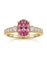 Purple oval sapphire engagement style ring with diamond shoulders in polished 18K yellow gold - SARATTI