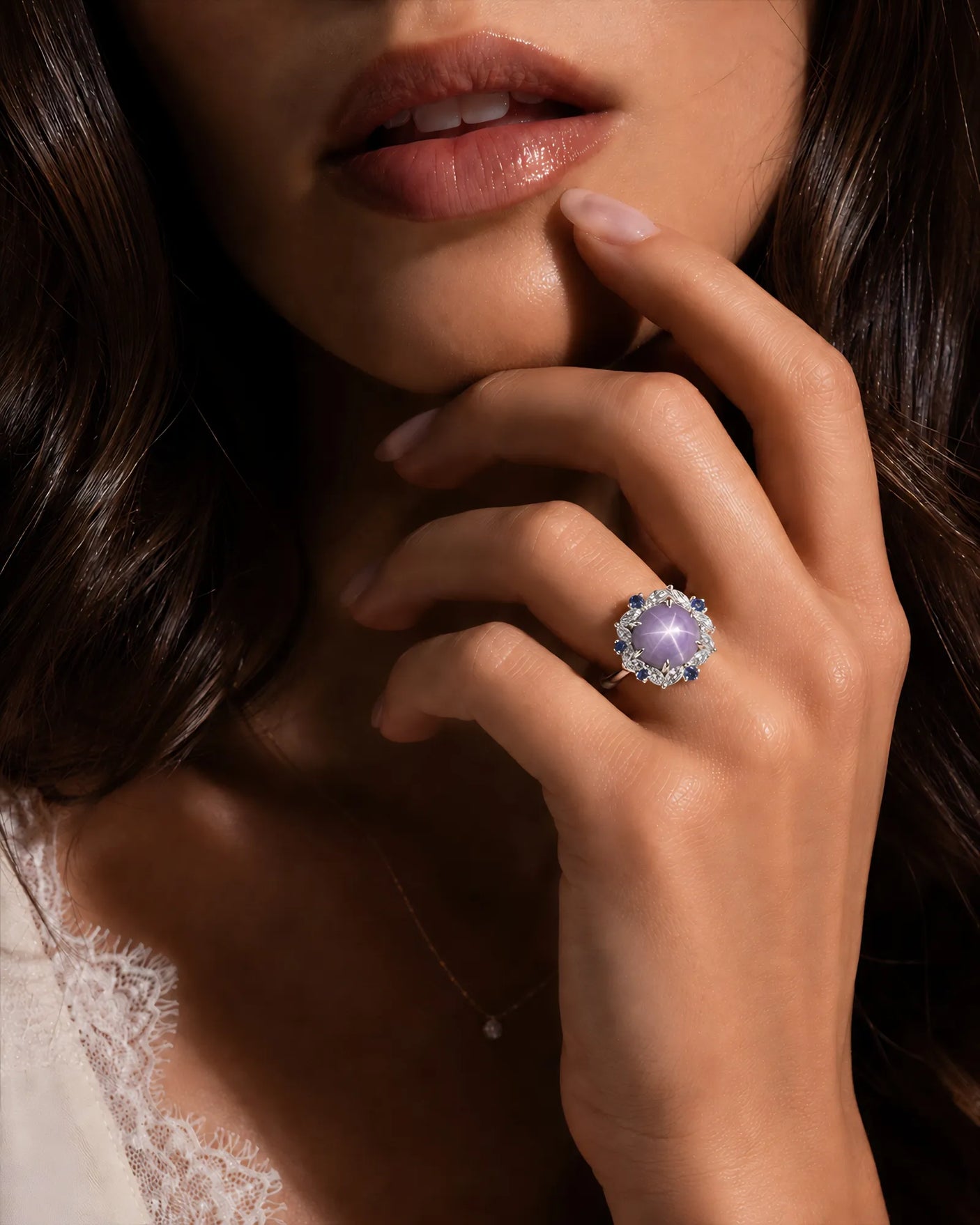Purple sapphire and diamond engagement ring with star effect in platinum | SARATTI