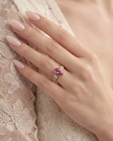 Purple sapphire diamond ring in 18K yellow gold with raised prong setting and open gallery | SARATTI