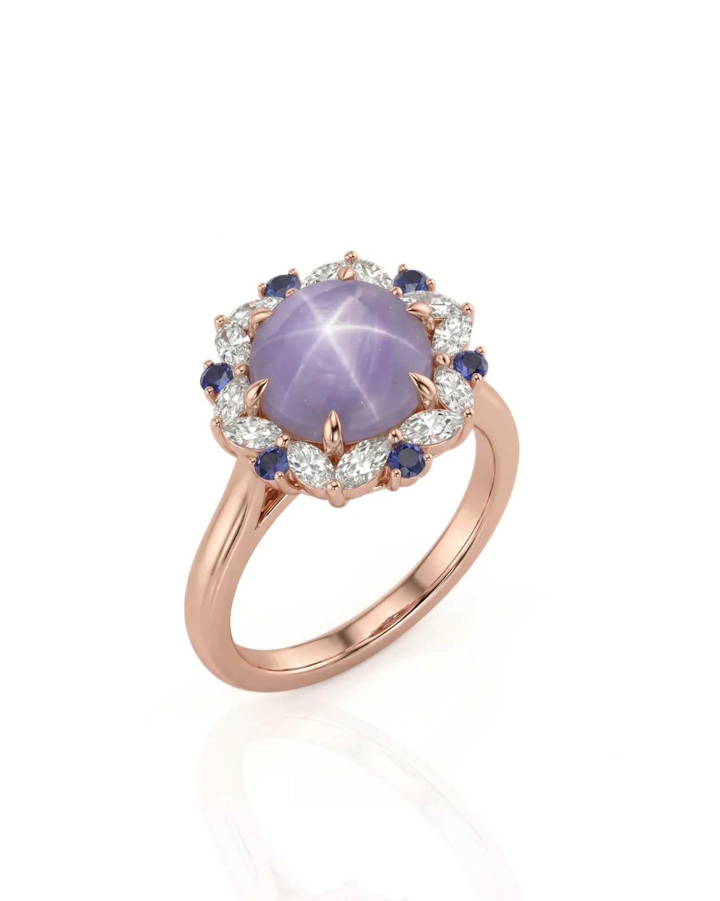 Purple star sapphire ring with marquise diamond halo in 18K rose gold | SARATTI