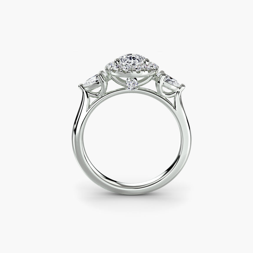 Three stone halo engagement ring mount with pavé band | SARATTI