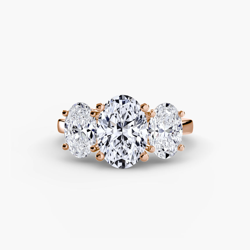 Oval three-stone engagement ring setting in rose gold | SARATTI
