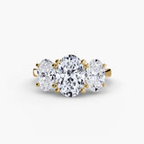 Three-stone diamond ring with gold setting on a white background - Oval three-stone diamond engagement ring mount yellow gold angle | SARATTI