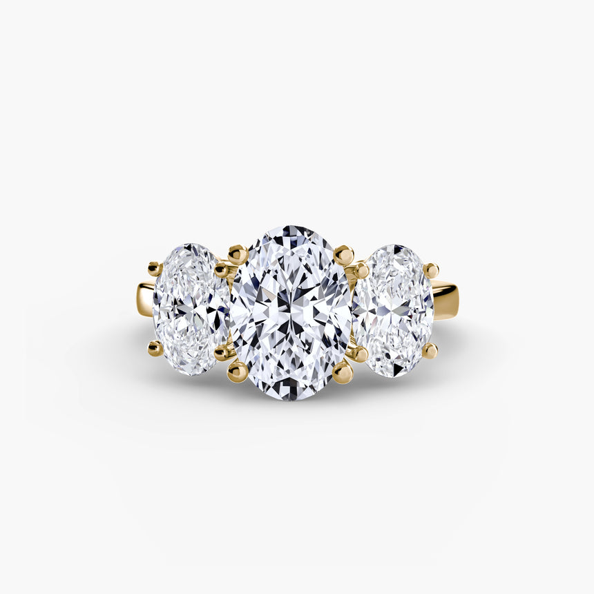 Oval three-stone diamond ring setting in yellow gold lower angle | SARATTI