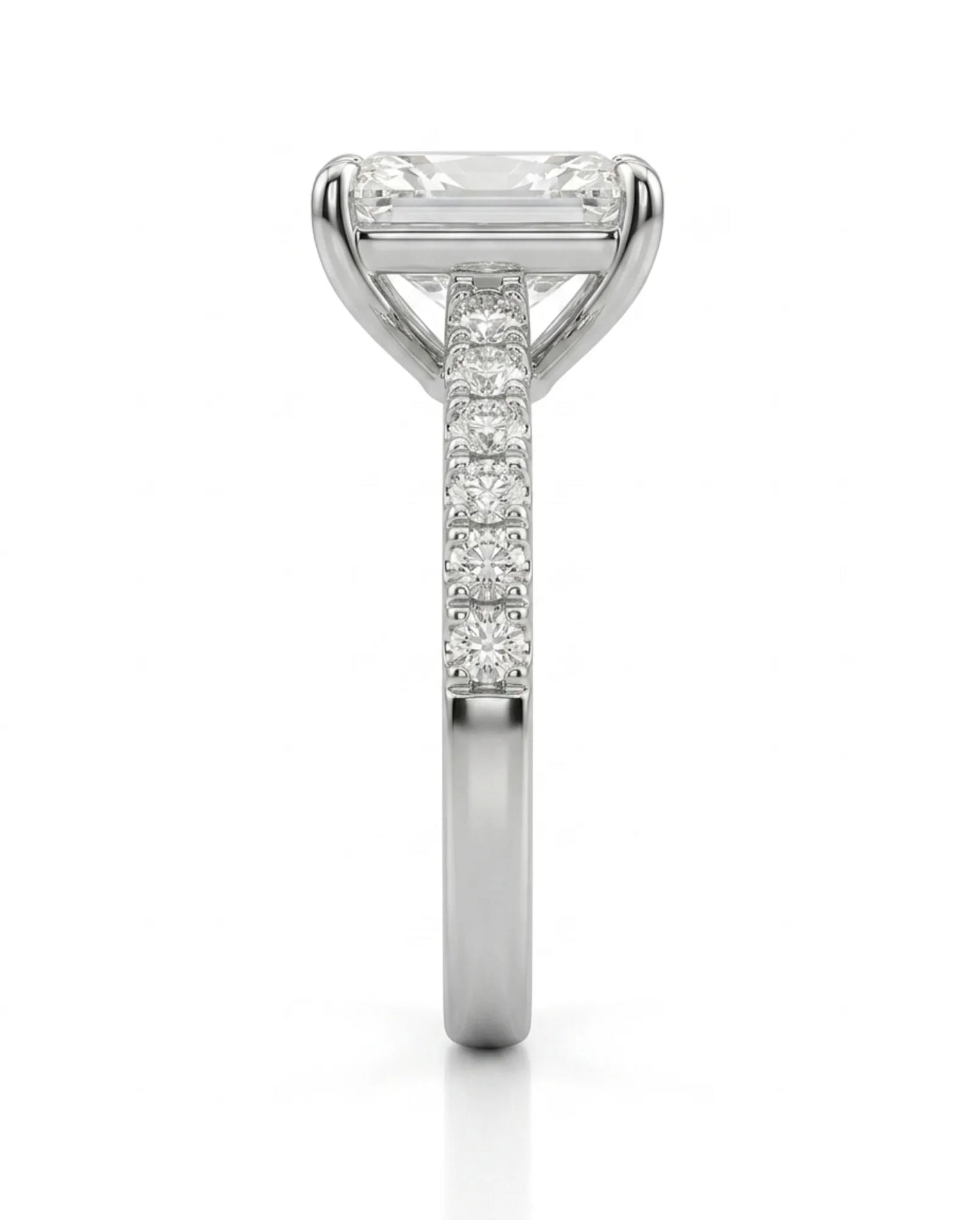 Radiant-cut diamond engagement ring with sparkling pavé shoulders in platinum for a sophisticated proposal | SARATTI