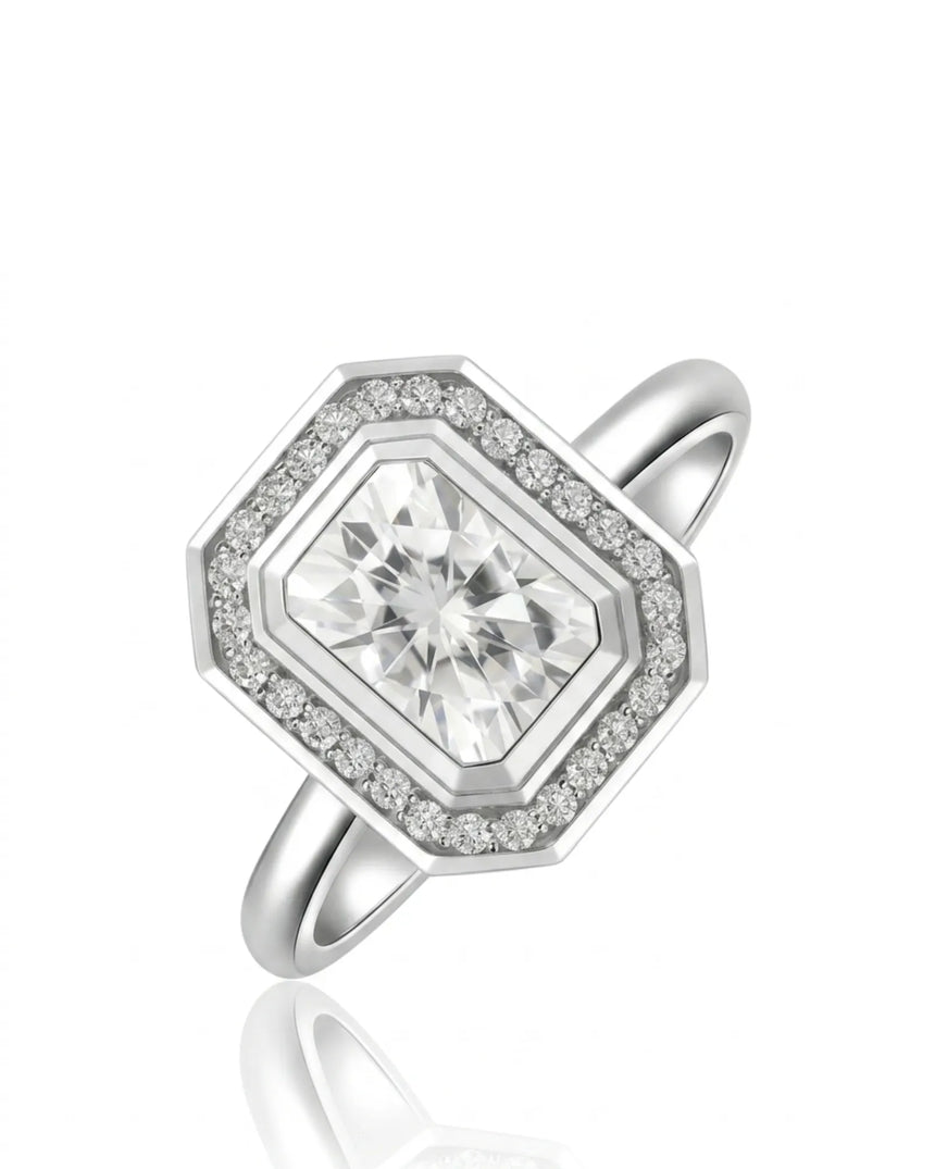 Radiant cut moissanite halo ring in 18K white gold with geometric bezel-style frame | SARATTI