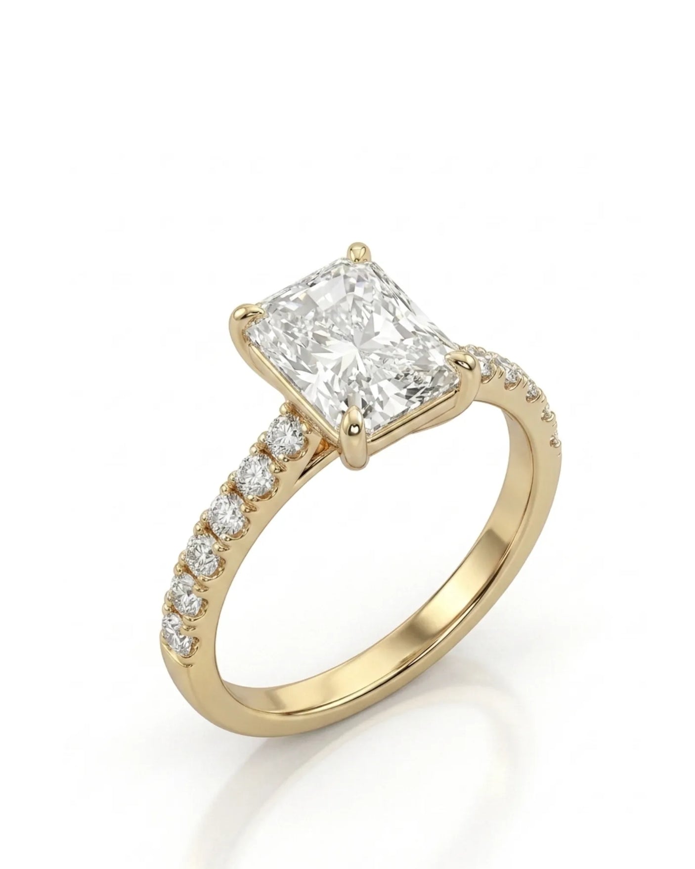 Radiant moissanite engagement ring with pavé side stones in yellow gold | SARATTI