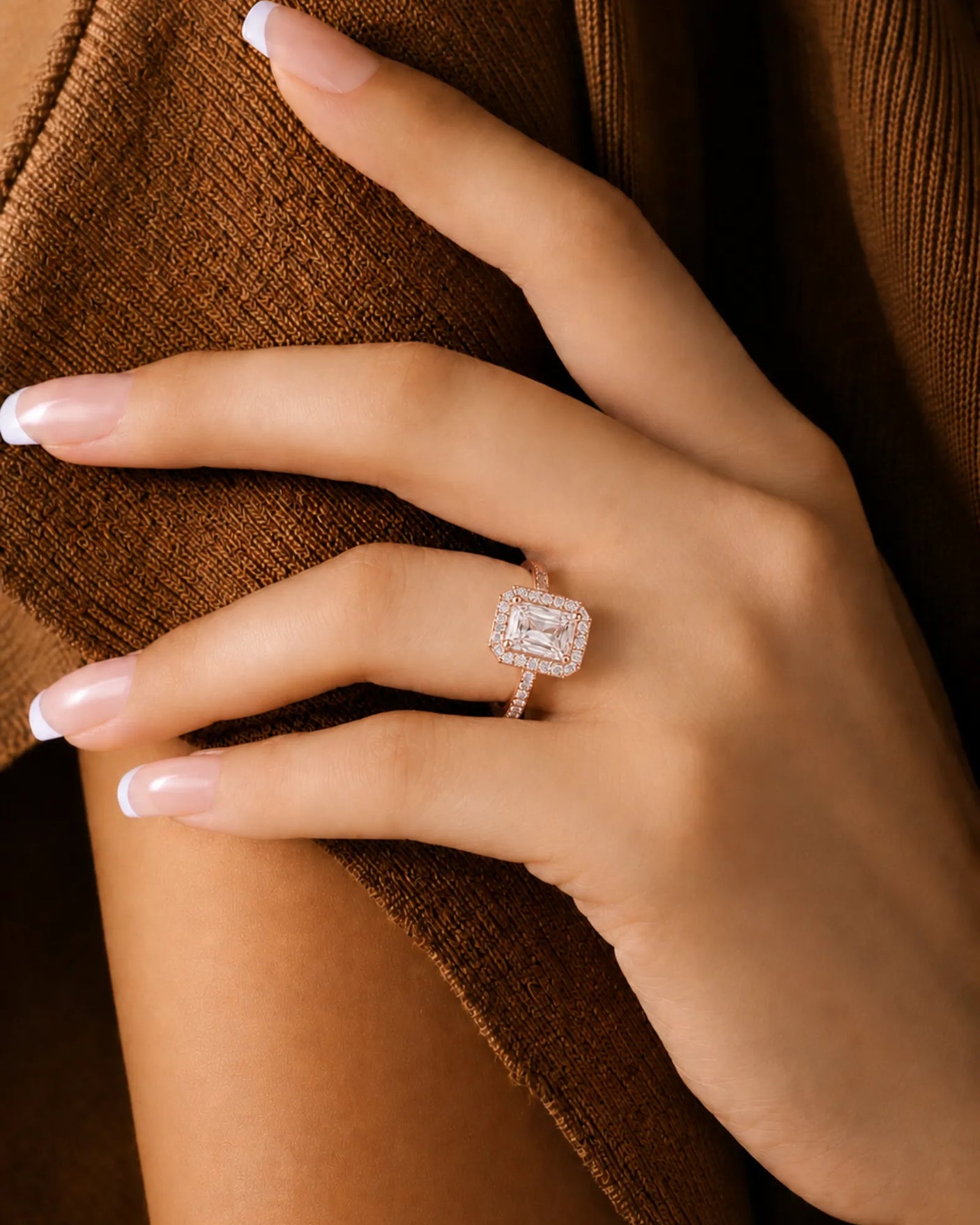 Radiant moissanite ring in rose gold with four-prong center and structured halo | SARATTI