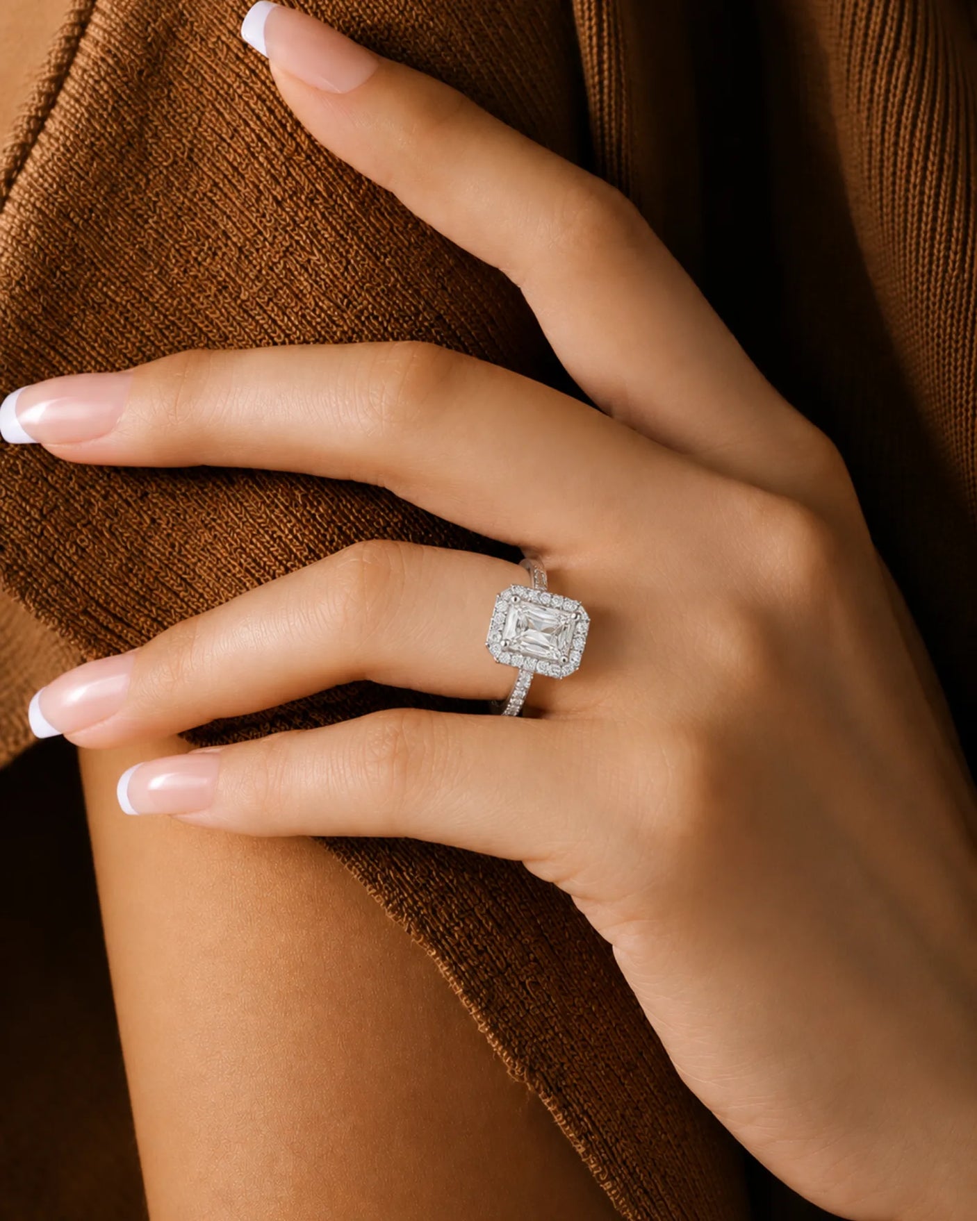 Radiant moissanite ring in white gold with four-prong center and structured halo | SARATTI
