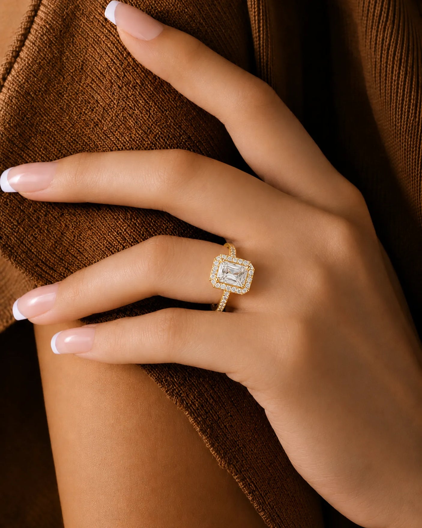 Radiant moissanite ring in yellow gold with four-prong center and rectangular halo | SARATTI