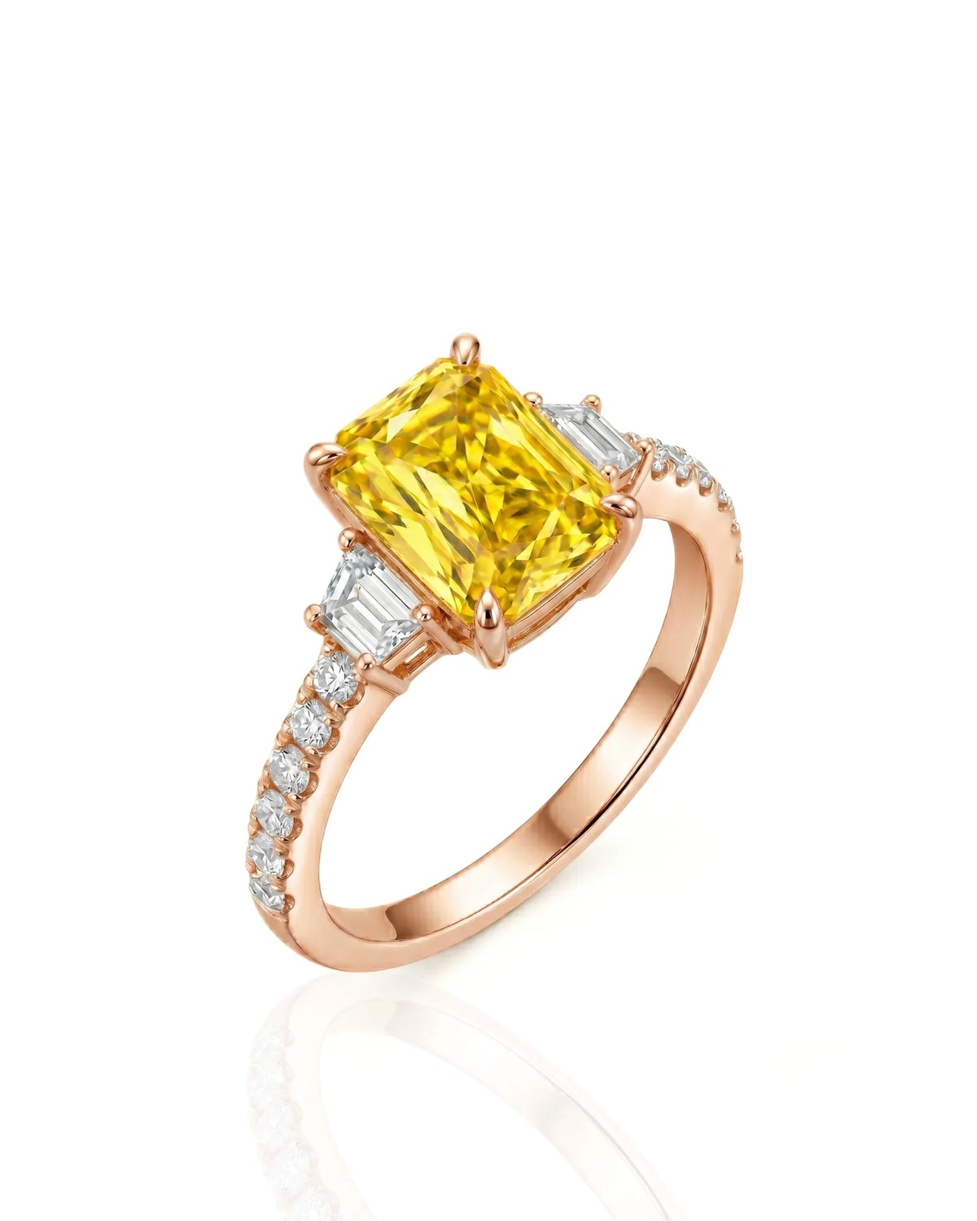 Radiant yellow sapphire ring with round and trapezoid diamonds in 18K rose gold | SARATTI