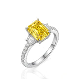 Three Stone Fancy Yellow Sapphire Ring with Diamonds