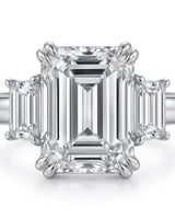 Rectangle moissanite ring with emerald side stones and polished platinum band | SARATTI