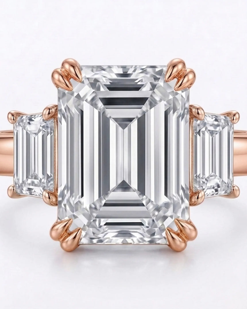 Rectangle moissanite ring with emerald side stones and polished rose gold band | SARATTI