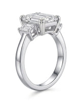 Rectangle moissanite ring with emerald side stones and polished white gold band | SARATTI