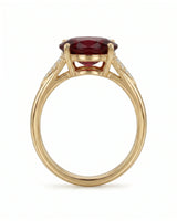 Red garnet engagement ring with tapered diamond shoulders in 18K yellow gold | SARATTI
