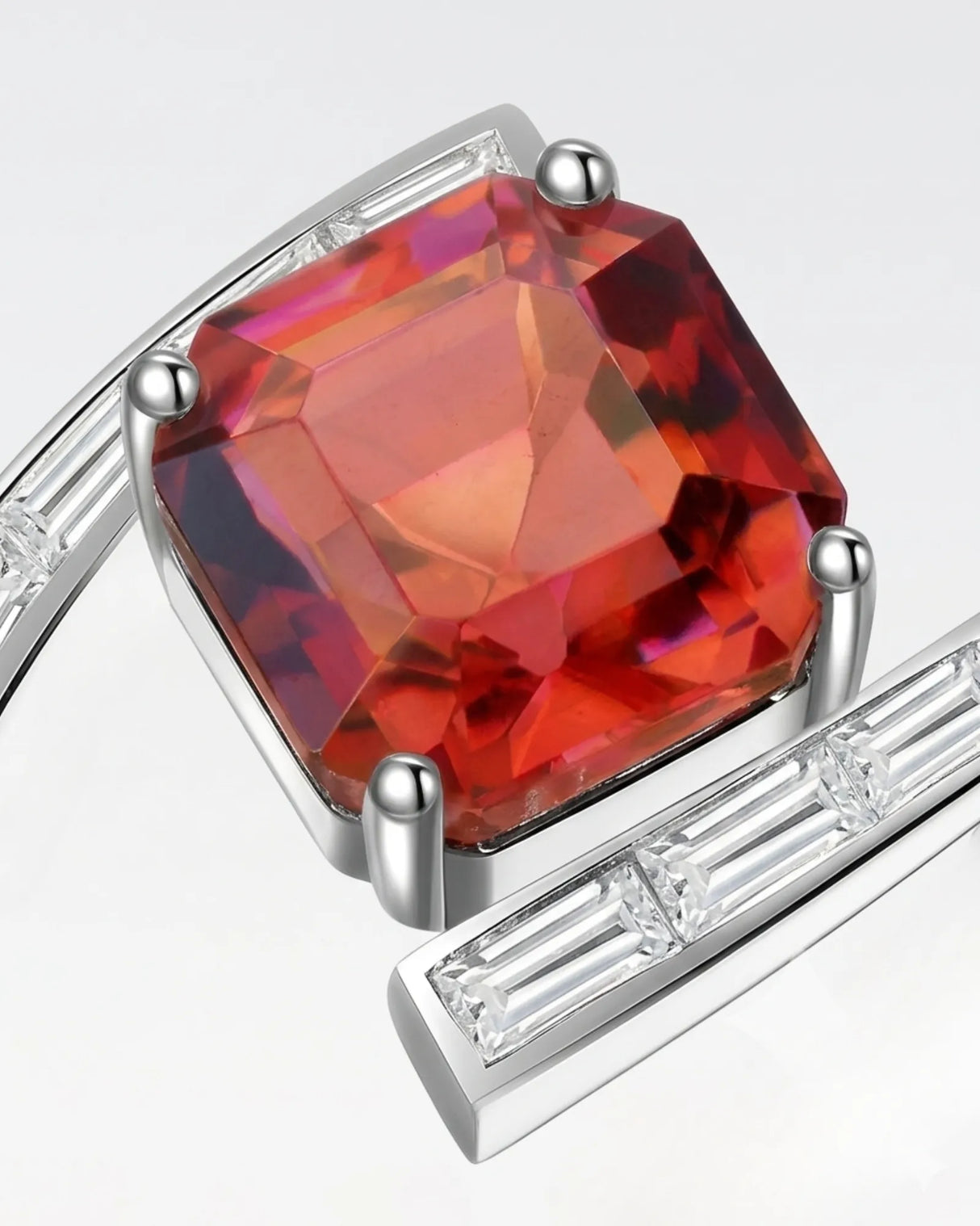 Red tourmaline engagement ring with curved baguette diamond band in 18K white gold | SARATTI