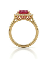 Red tourmaline engagement ring with ornate diamond halo in 18K yellow gold | SARATTI
