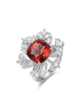 Red tourmaline ring with cushion center stone and rose cut diamonds in polished platinum | SARATTI