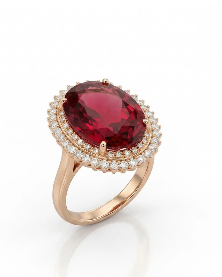 Red tourmaline ring with oval center stone and double diamond halo in 18K rose gold | SARATTI