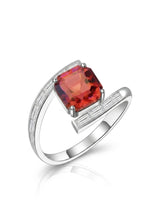 Reddish pink tourmaline ring with geometric center stone and baguette diamonds in 18K white gold | SARATTI