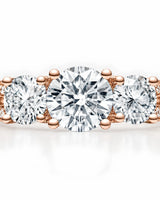 Refined 18K rose gold split-shank ring with round moissanite brilliance throughout | SARATTI.