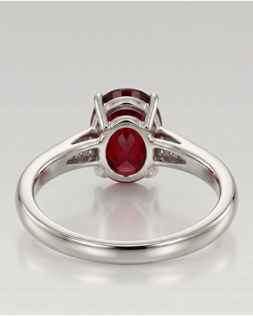 Regalis tapered diamond garnet ring with oval red gemstone in polished platinum | SARATTI