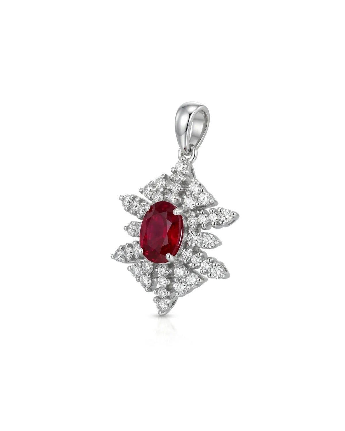 Reverse view of 18K gold ruby pendant showing radiating openwork snowflake construction | SARATTI