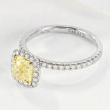Ring with a yellow diamond and white diamonds set in Platinum | SARATTI