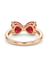 Romantic bow style ruby ring with twin heart gemstones in 18K Rose Gold | SARATTI
