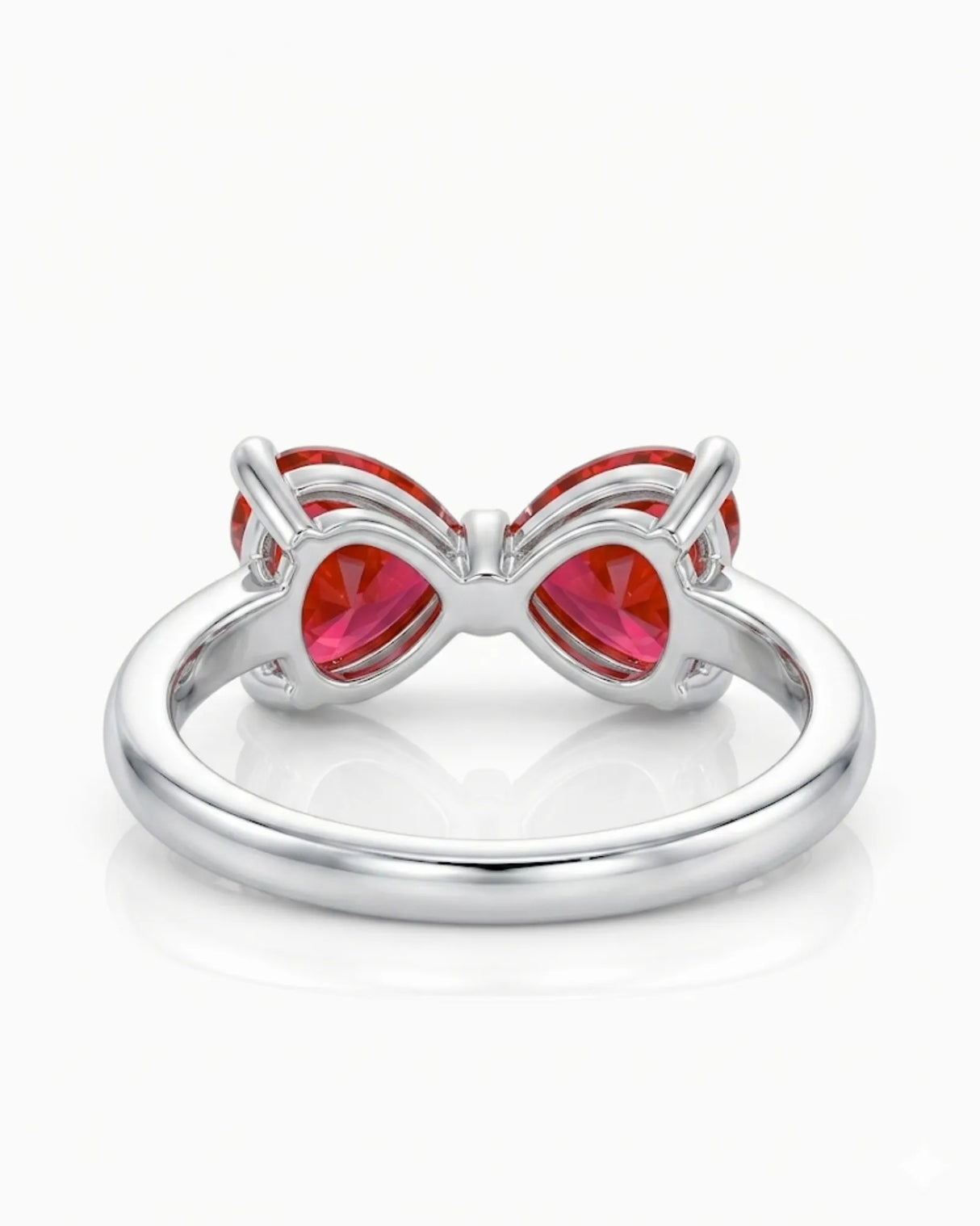 Romantic bow style ruby ring with twin heart gemstones in 18K White Gold | SARATTI
