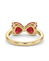 Romantic bow style ruby ring with twin heart gemstones in 18K Yellow Gold | SARATTI
