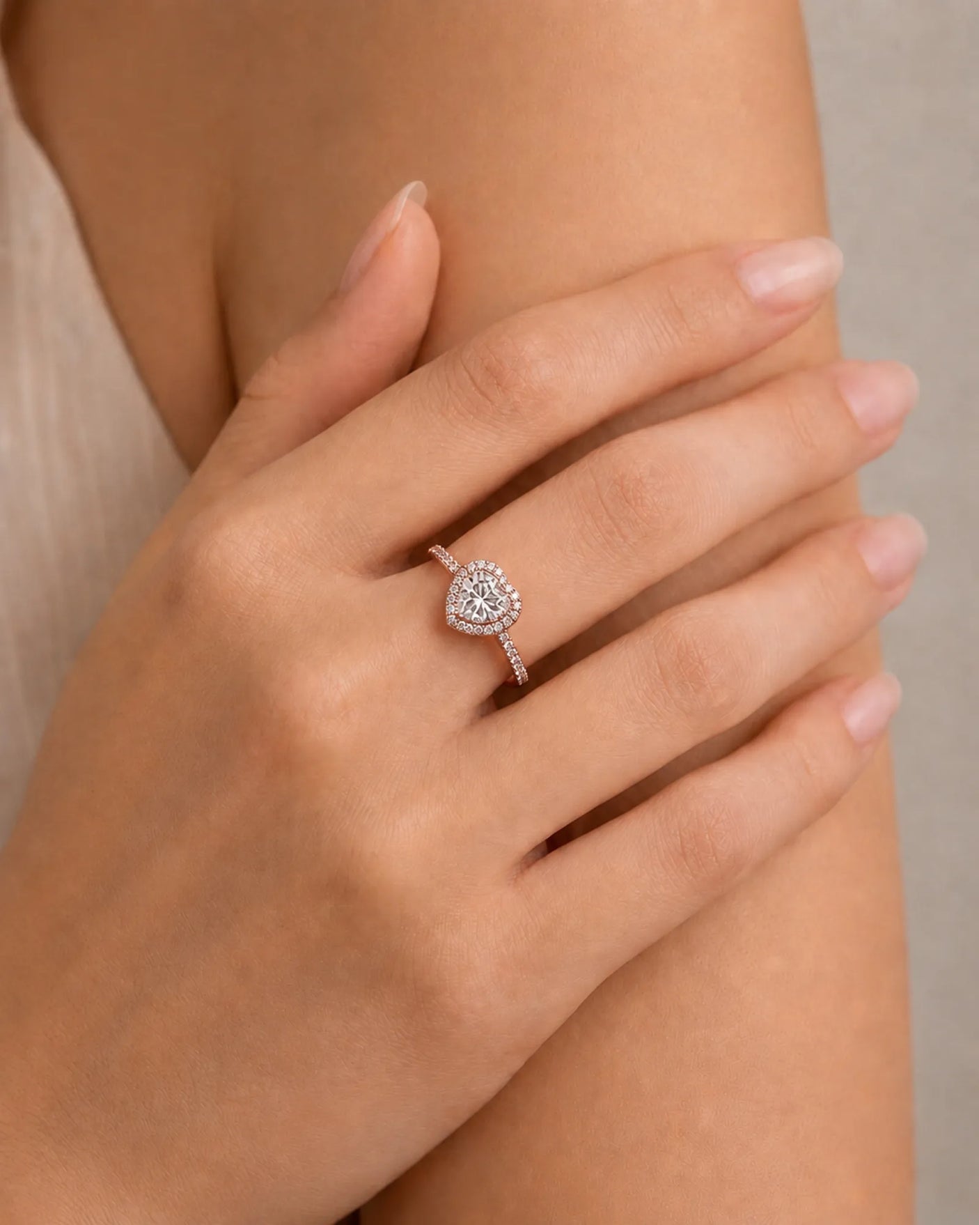 Romantic heart-shaped moissanite proposal ring with pavé halo and 18K rose gold band | SARATTI