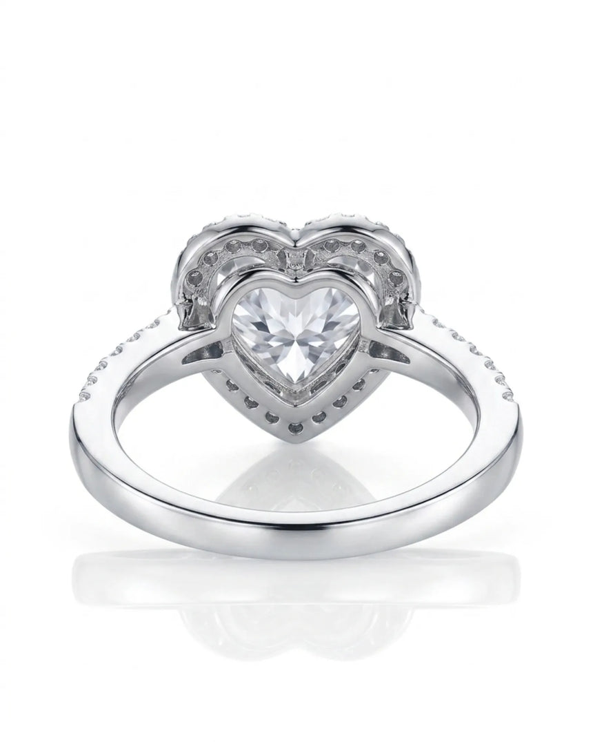 Romantic heart-shaped moissanite proposal ring with pavé halo and a refined platinum band | SARATTI