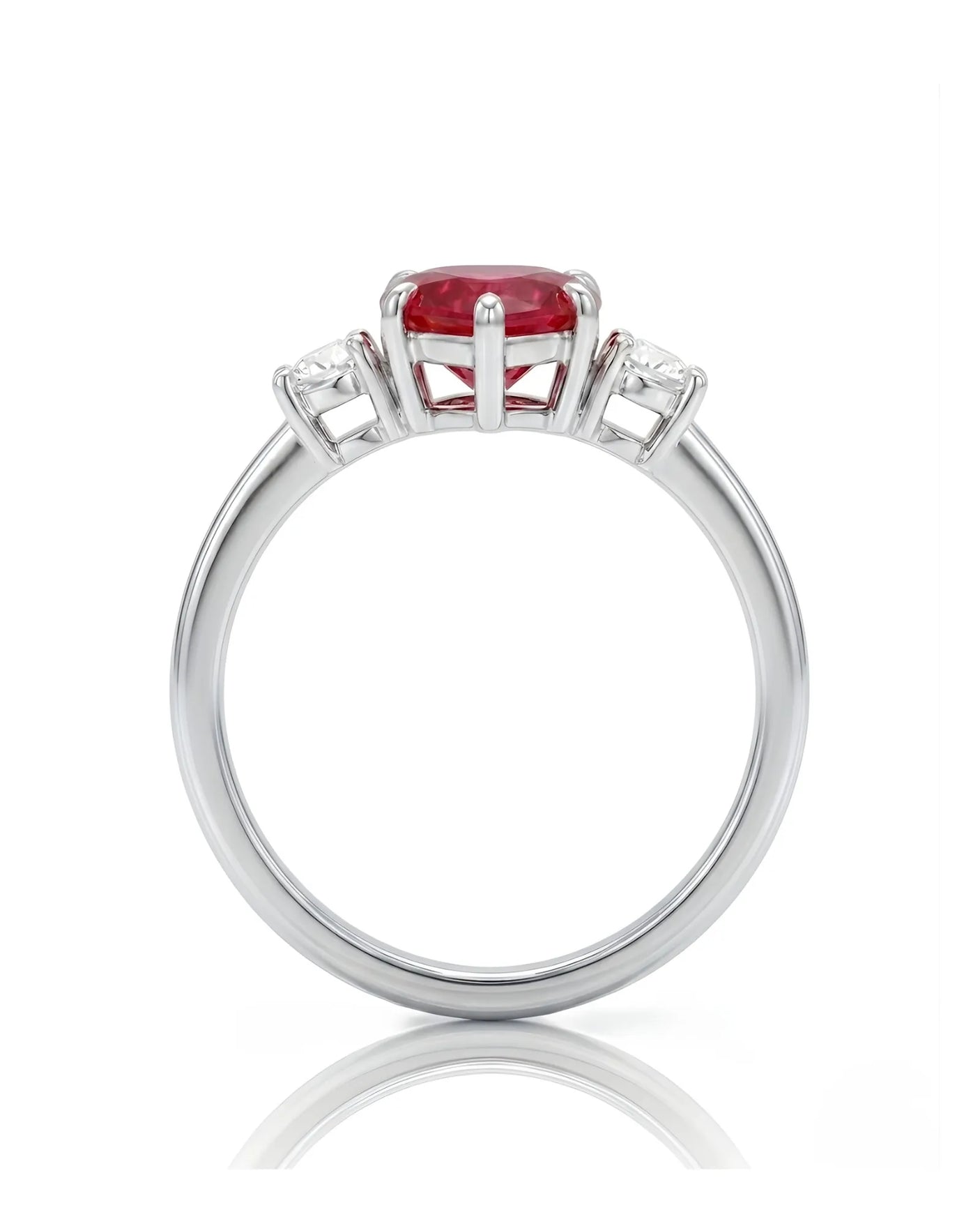 Romantic heart-shaped ruby ring with two diamond side stones in Platinum | SARATTI