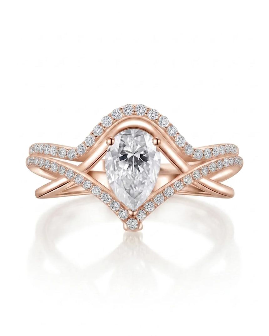 Romantic pear moissanite wedding set with curved bands for an individual rose gold engagement | SARATTI