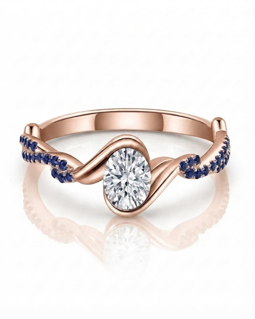 Romantic rose gold moissanite engagement ring with blue sapphire pavé for a distinctive proposal | SARATTI
