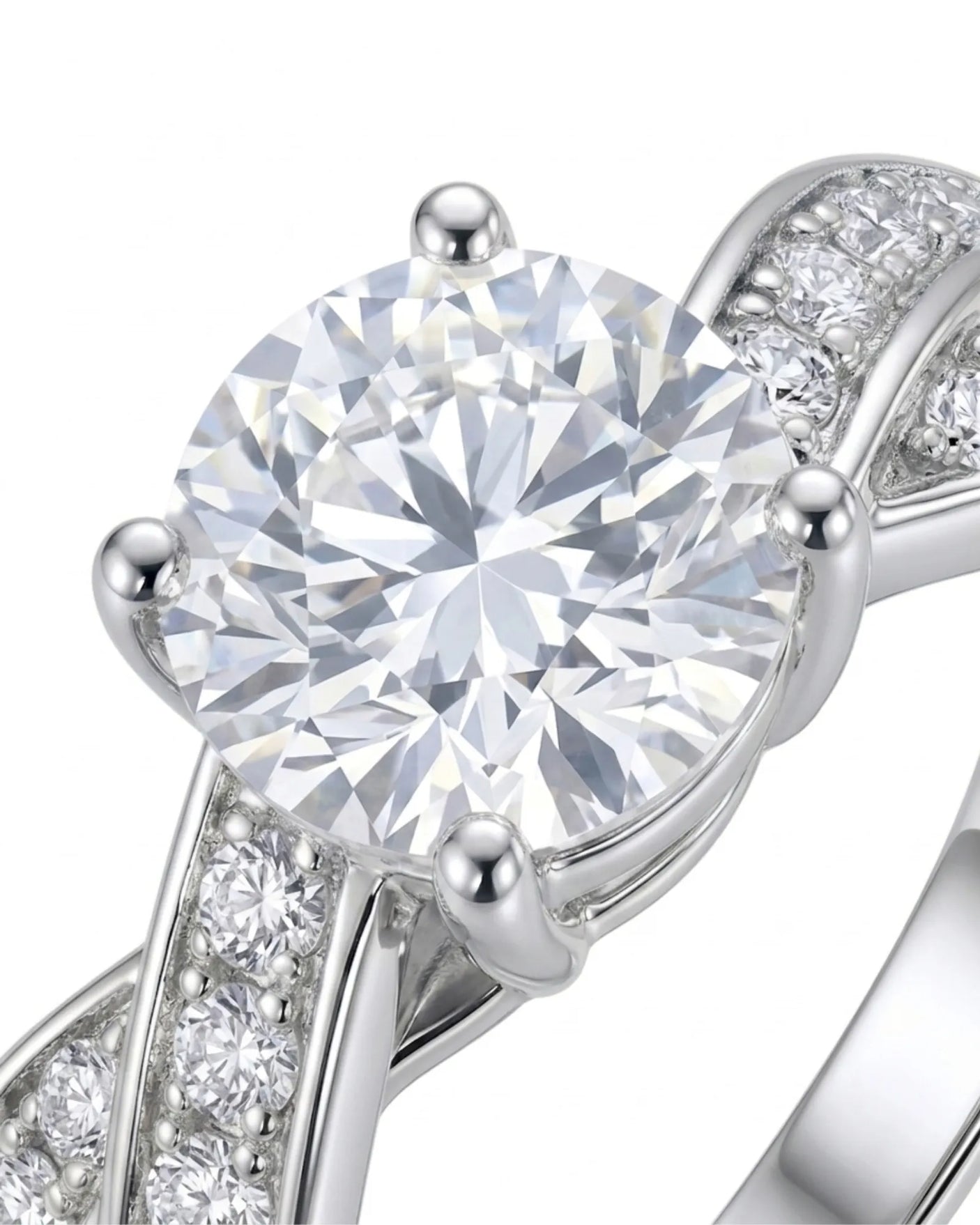 Romantic round moissanite proposal ring with twisted shank crafted in refined 18K white gold | SARATTI