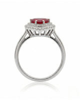 Romantic ruby ring with heart center stone and round diamonds in platinum | SARATTI