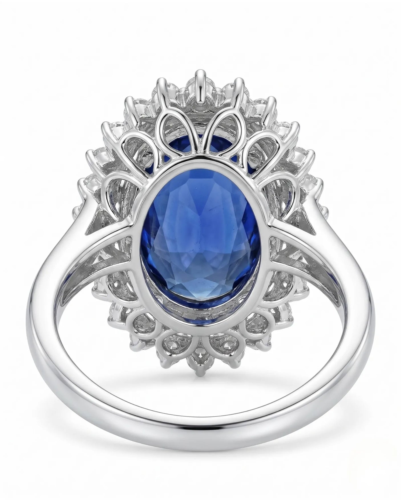 Romantic sapphire ring with delicate round diamond halo in polished platinum | SARATTI