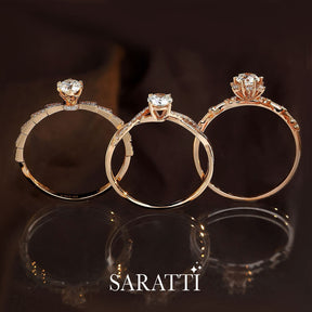 Upright Shot of the Echelle d’Amour Diamond Engagement Ring on the far right of the ring selection | Saratti 